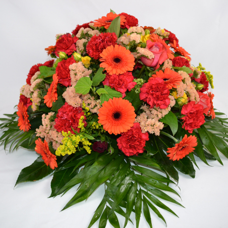 Coussin rond rouge orangé